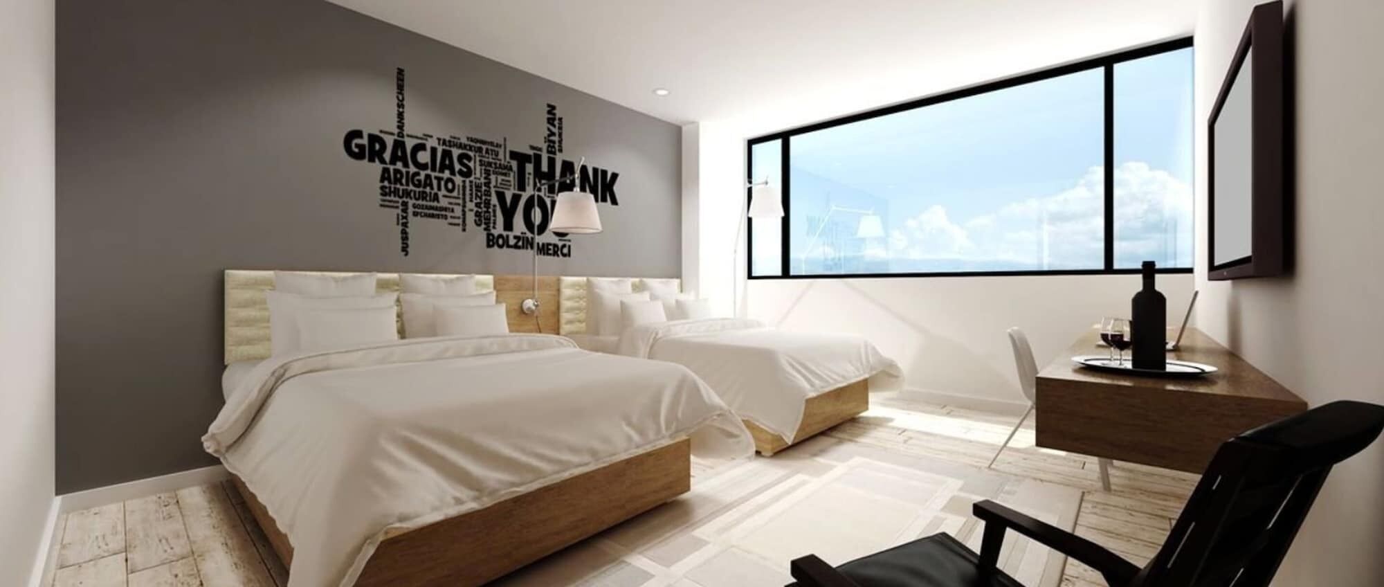 Luxe beddengoed, een minibar, een kluis op de kamer, een bureau