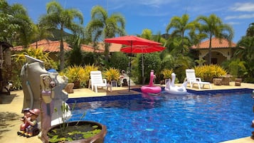 Outdoor pool, free cabanas, pool umbrellas