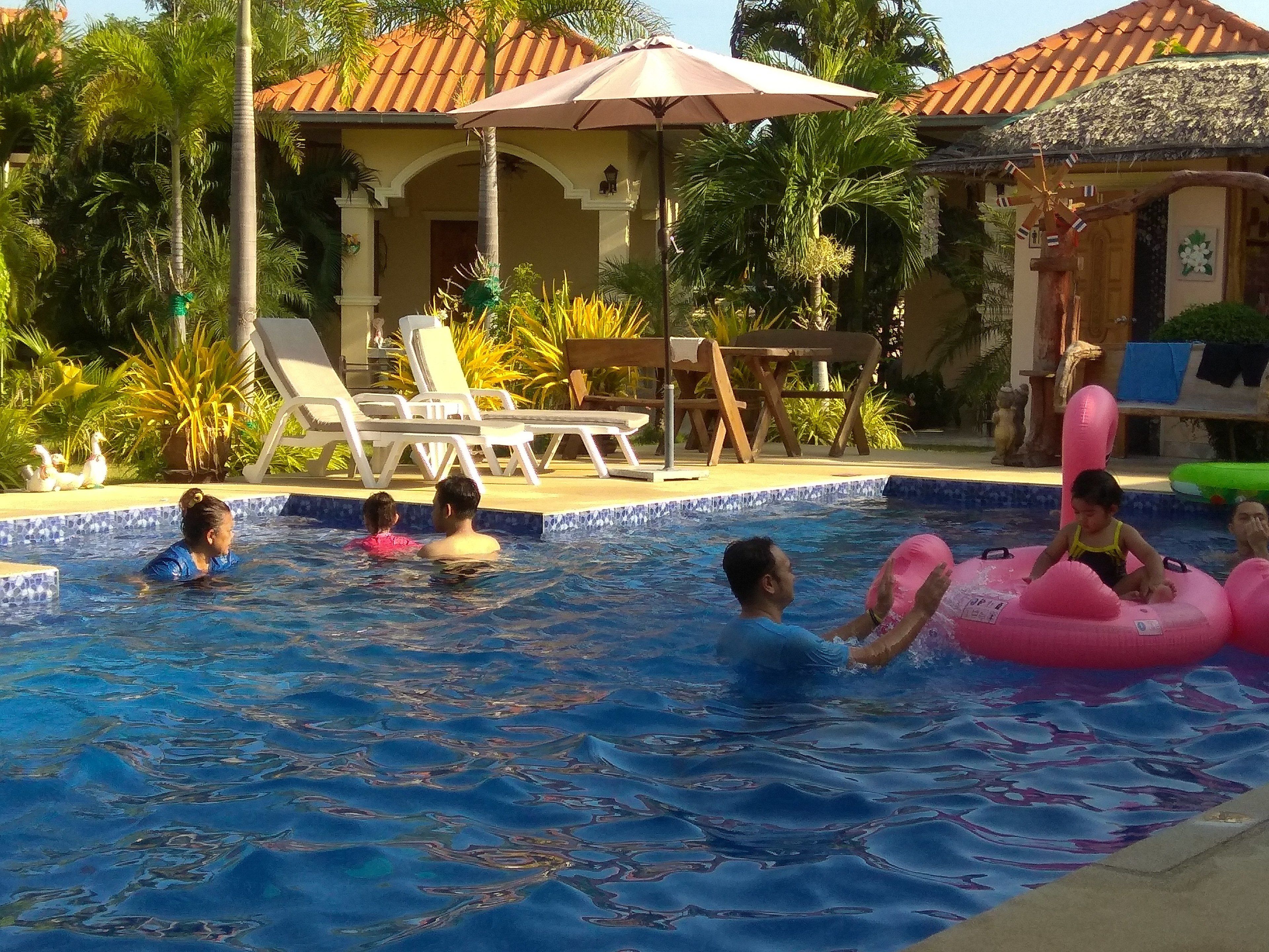 outdoor pool, free pool cabanas, pool umbrellas