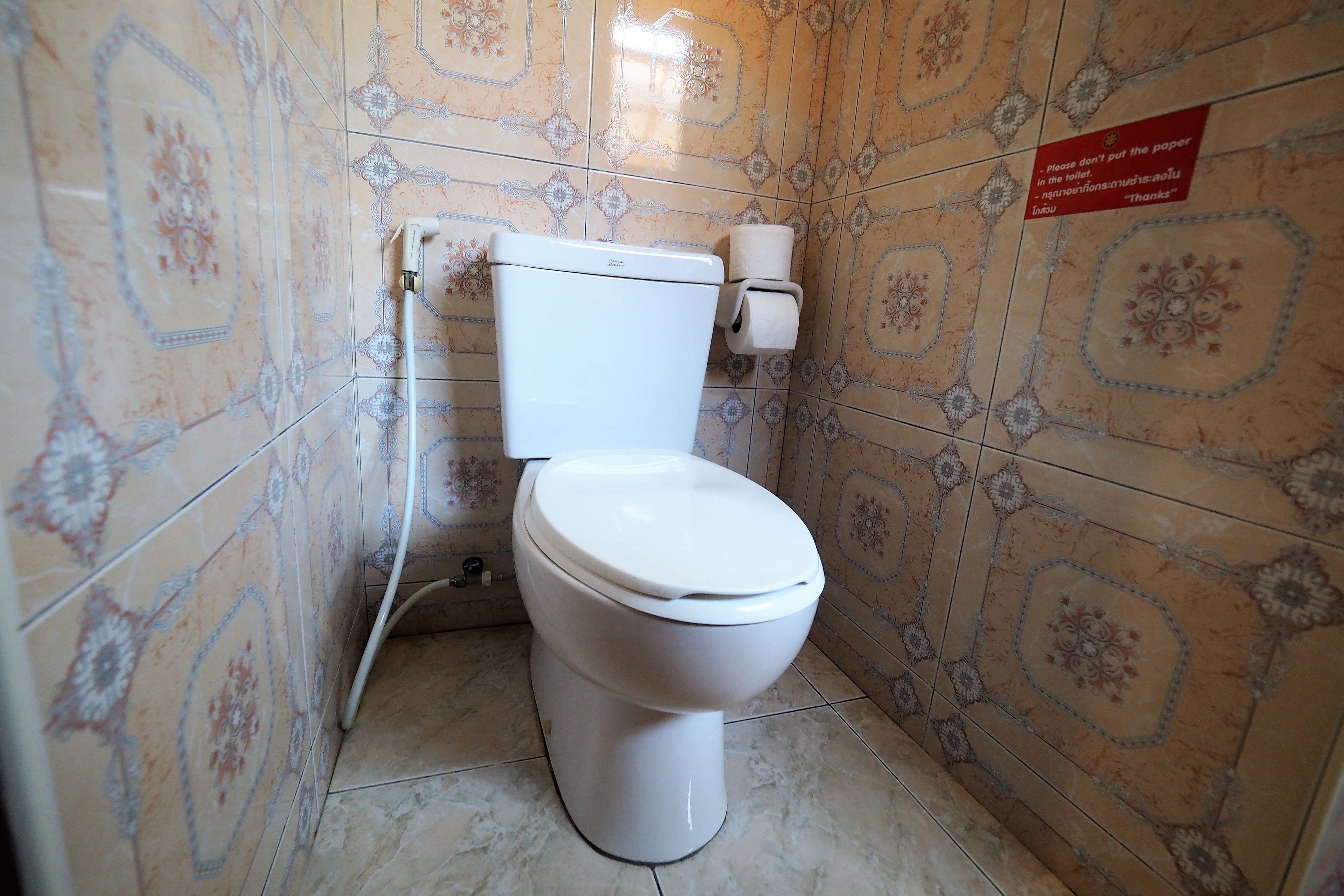 bungalow | bathroom | shower, hydromassage showerhead, bidet, towels