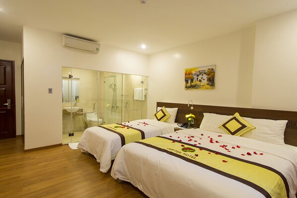 Deluxe Triple Room | Minibar, in-room safe, desk, free WiFi - Jupiter Hotel (Da Nang)