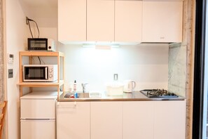 Familjerum | Eget kök | Kylskåp, mikrovågsugn, spishäll och vattenkokare