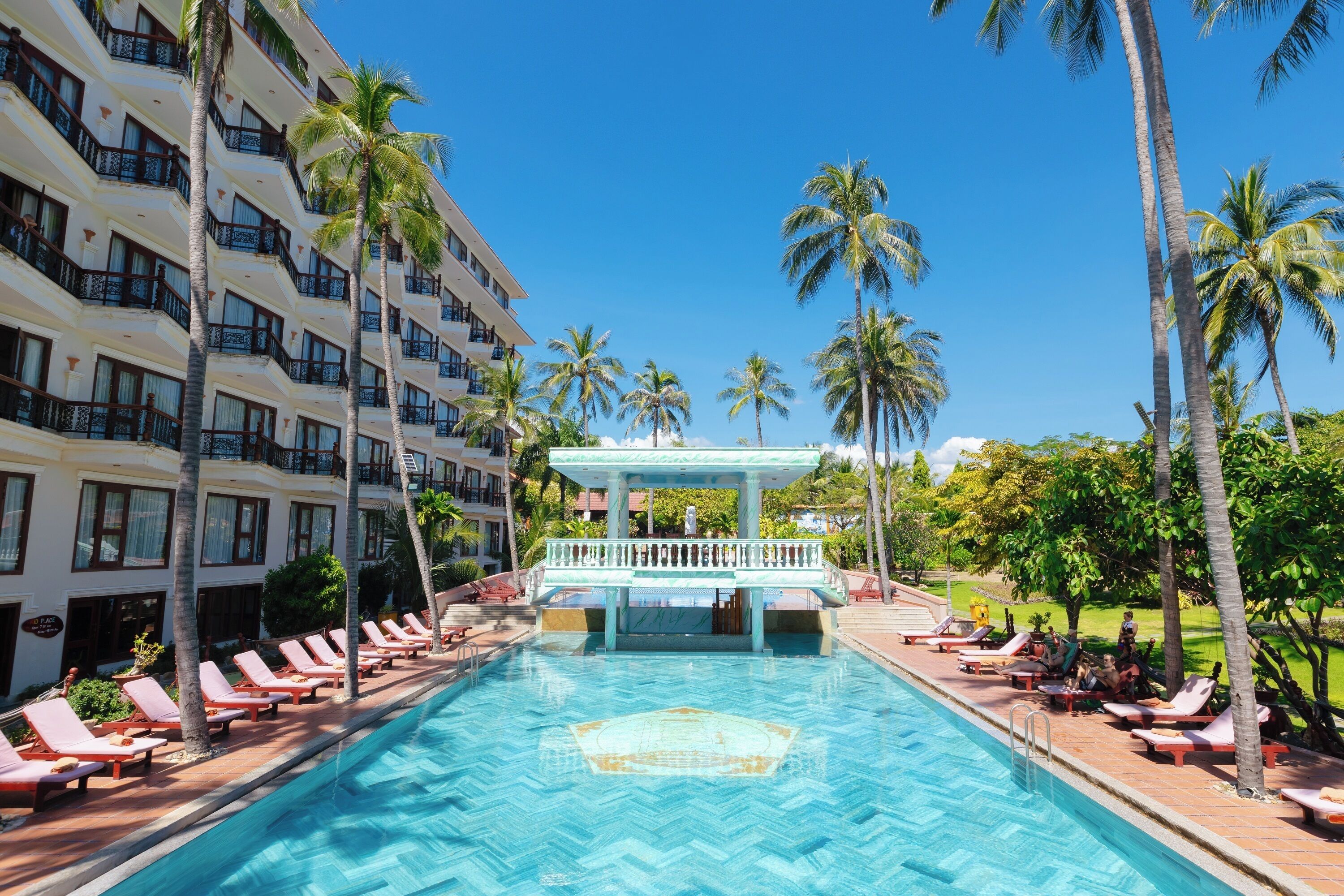 Outdoor pool, open 7:00 AM to 9:00 PM, pool umbrellas, sun loungers