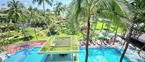 Outdoor pool, open 7:00 AM to 9:00 PM, pool umbrellas, pool loungers