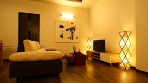 Condo luxo, vários quartos | Sala de estar