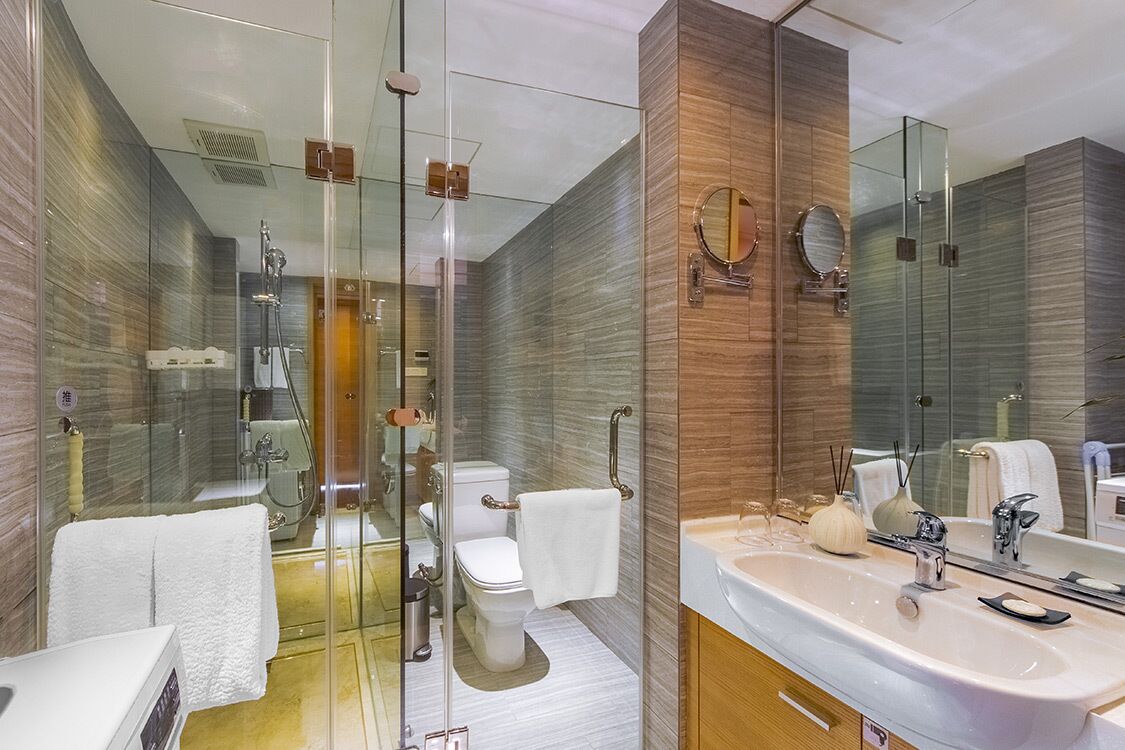 two bedroom deluxe | bathroom | shower, free toiletries, hair dryer, bathrobes