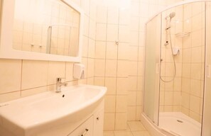 Shower, free toiletries, hair dryer, towels