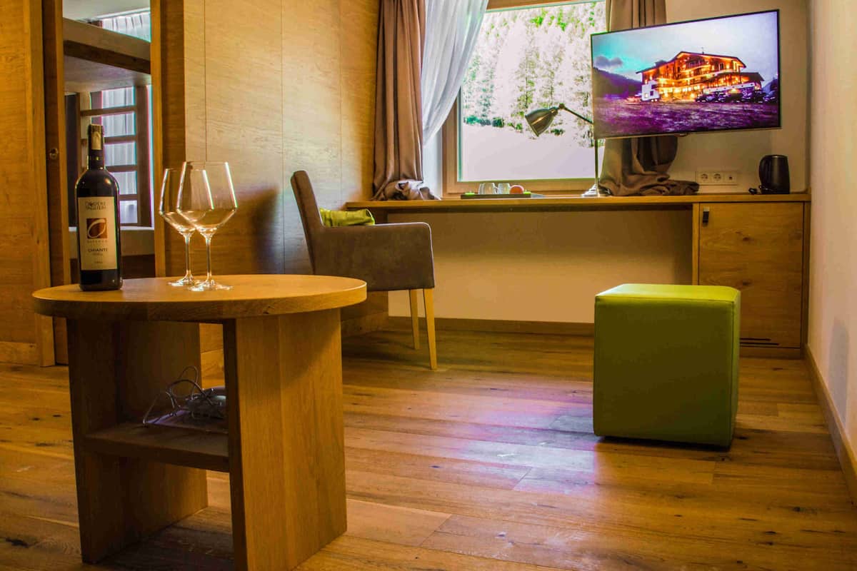 Family Suite | Living area | Flat-screen TV