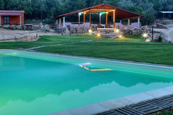 Seasonal outdoor pool, pool loungers