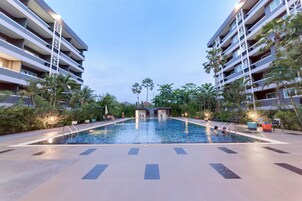 Outdoor pool, pool umbrellas, sun loungers