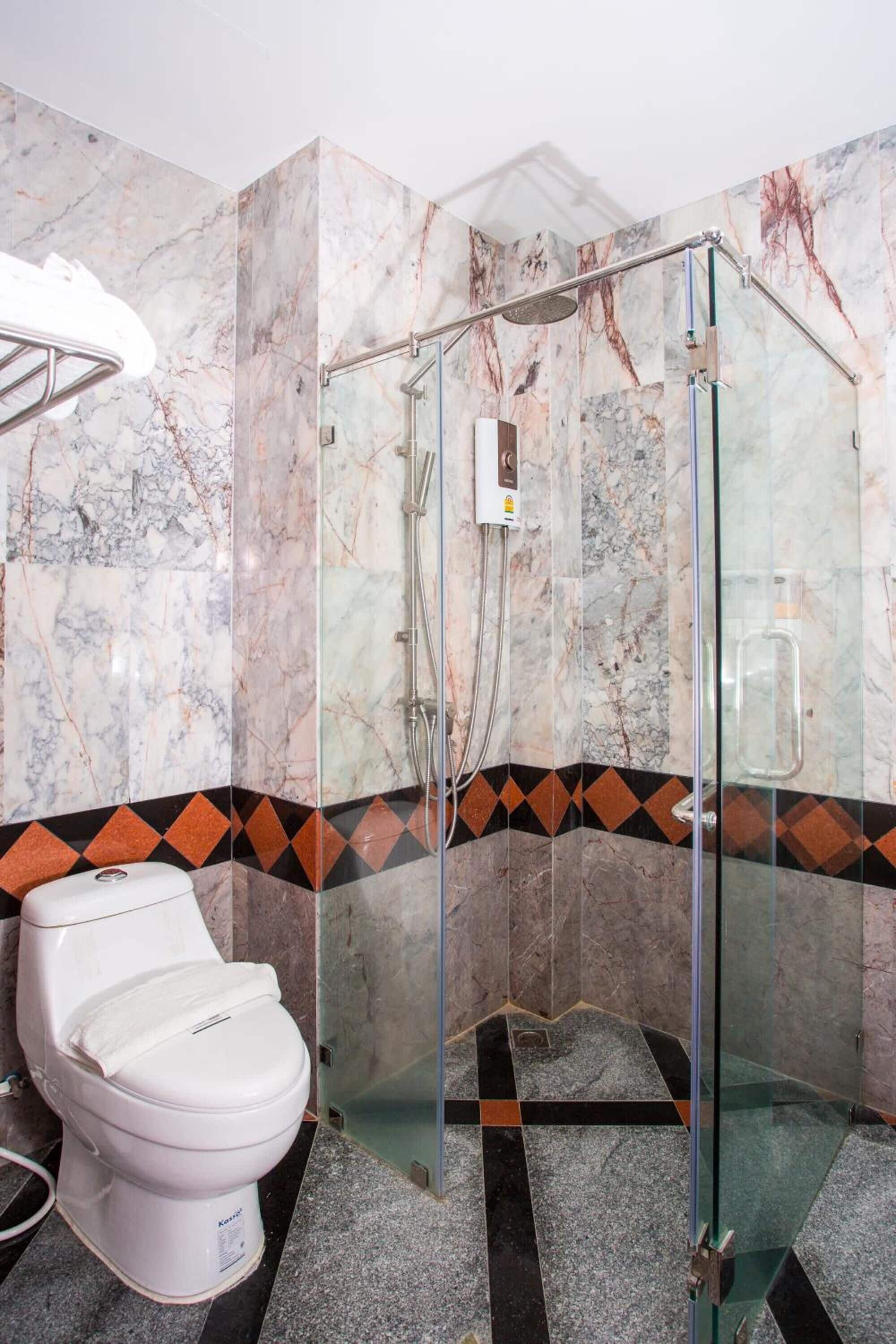 shower, free toiletries, hair dryer, towels