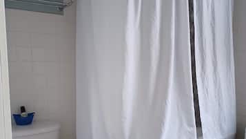 Suite, 1 King Bed | Bathroom | Free toiletries, hair dryer, bathrobes, towels