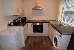 Appartamento Superior, 2 camere da letto | Cucina privata | Frigorifero, microonde, forno, piano cottura