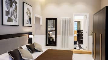 Suite Familiale, chambres communicantes | Minibar, coffres-forts dans les chambres, bureau, chambres insonorisées