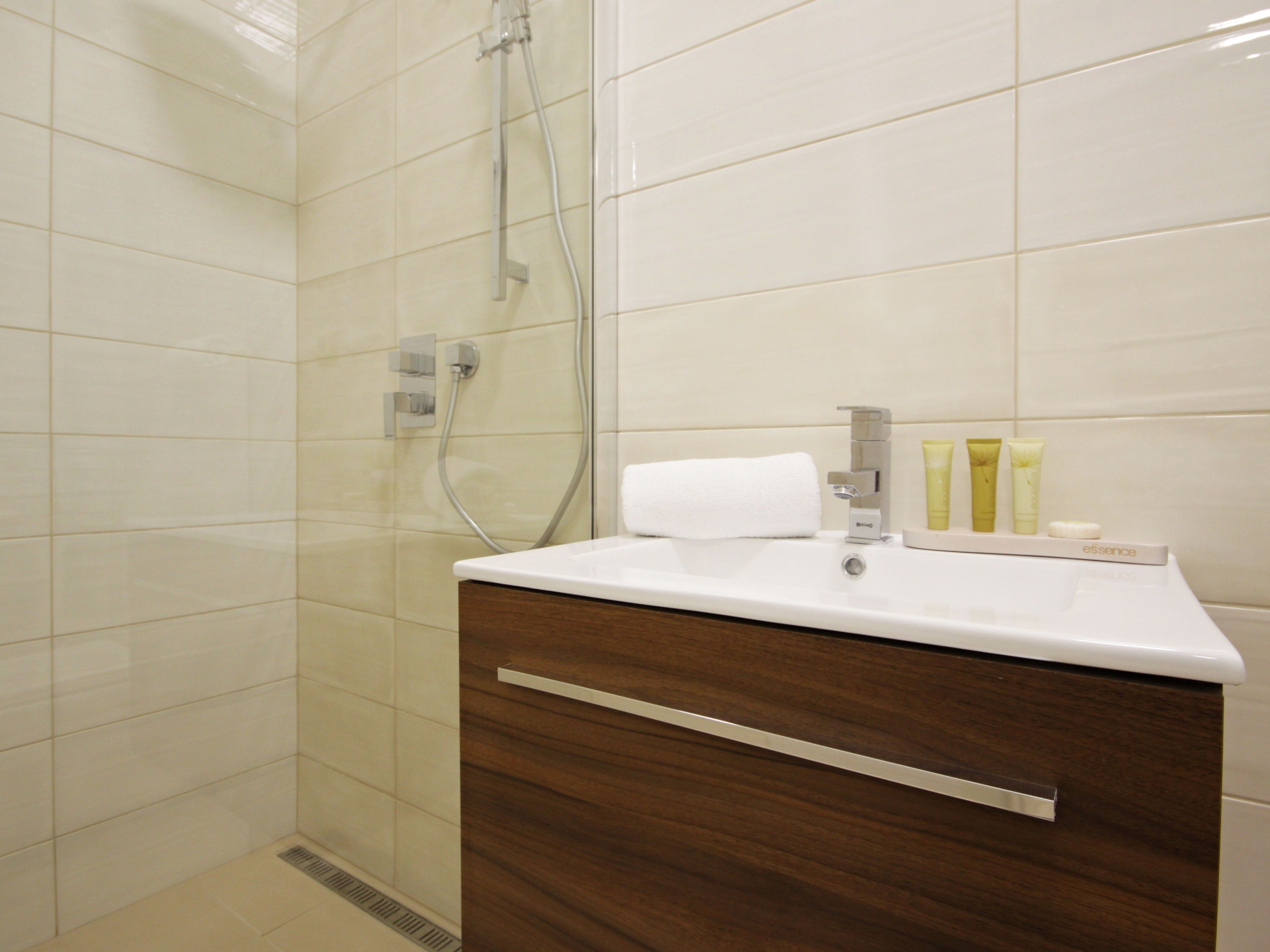double room | bathroom amenities | shower, rainfall showerhead, eco-friendly toiletries, hair dryer