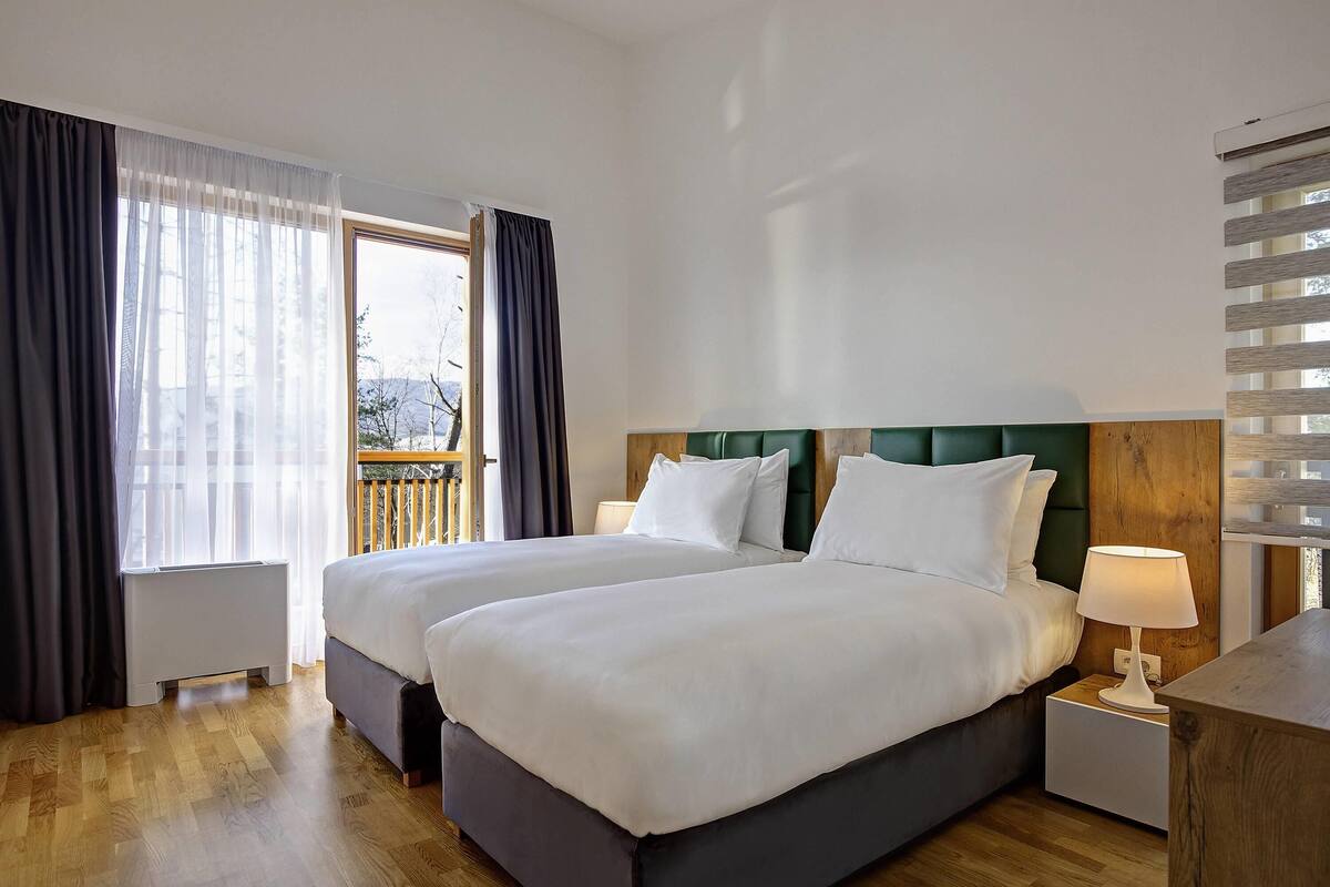 Deluxe Villa, Multiple Beds, Balcony | Premium bedding, minibar, in-room safe, desk