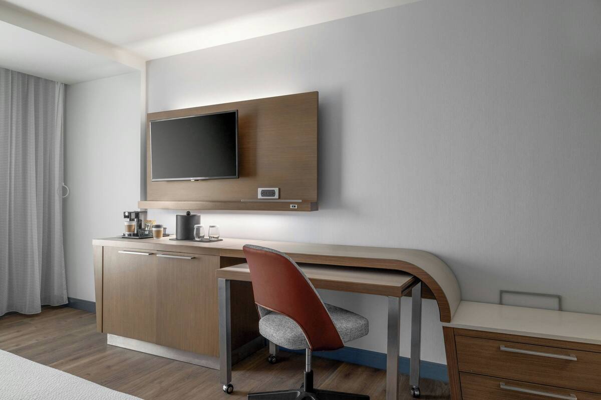 Desk, laptop workspace, blackout curtains, iron/ironing board
