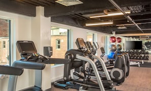 Stay fit with our well-equipped gym featuring treadmills, ellipticals, and weight machines.