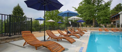 Seasonal outdoor pool, pool loungers