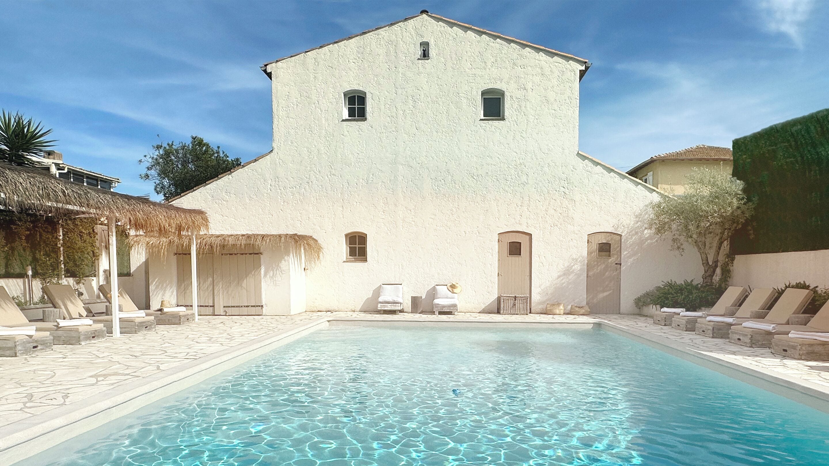 outdoor pool, pool umbrellas, pool loungers