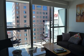 Two Bedroom Harbour Views Apartment | Living room | Flat-screen TV - Two Bedroom Harbour Views Apartment (Auckland)