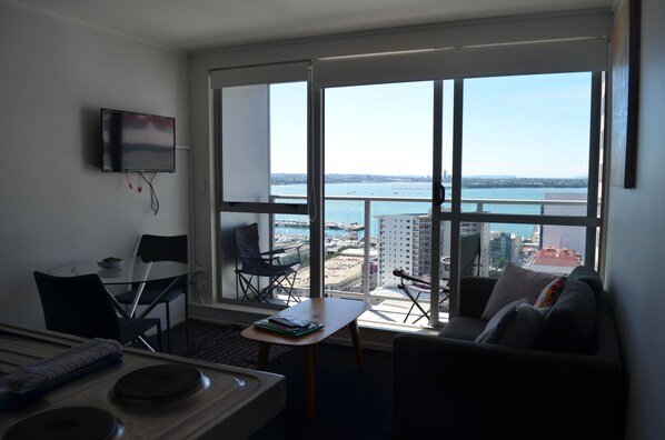Two Bedroom Harbour Views Apartment | Living area | Flat-screen TV - Two Bedroom Harbour Views Apartment (Auckland)