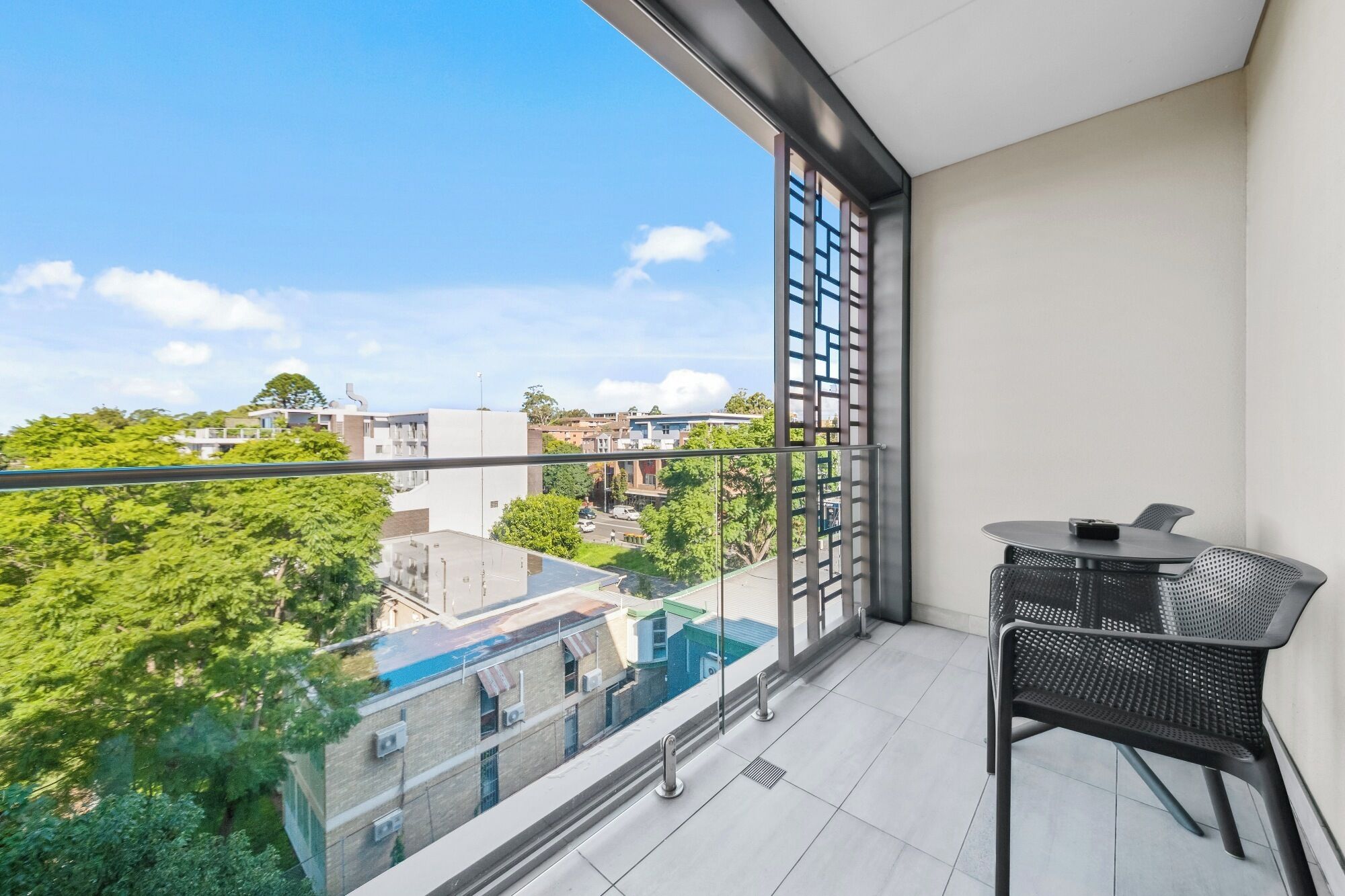 Deluxe Queen Studio with balcony | Premium bedding, in-room safe, desk, soundproofing