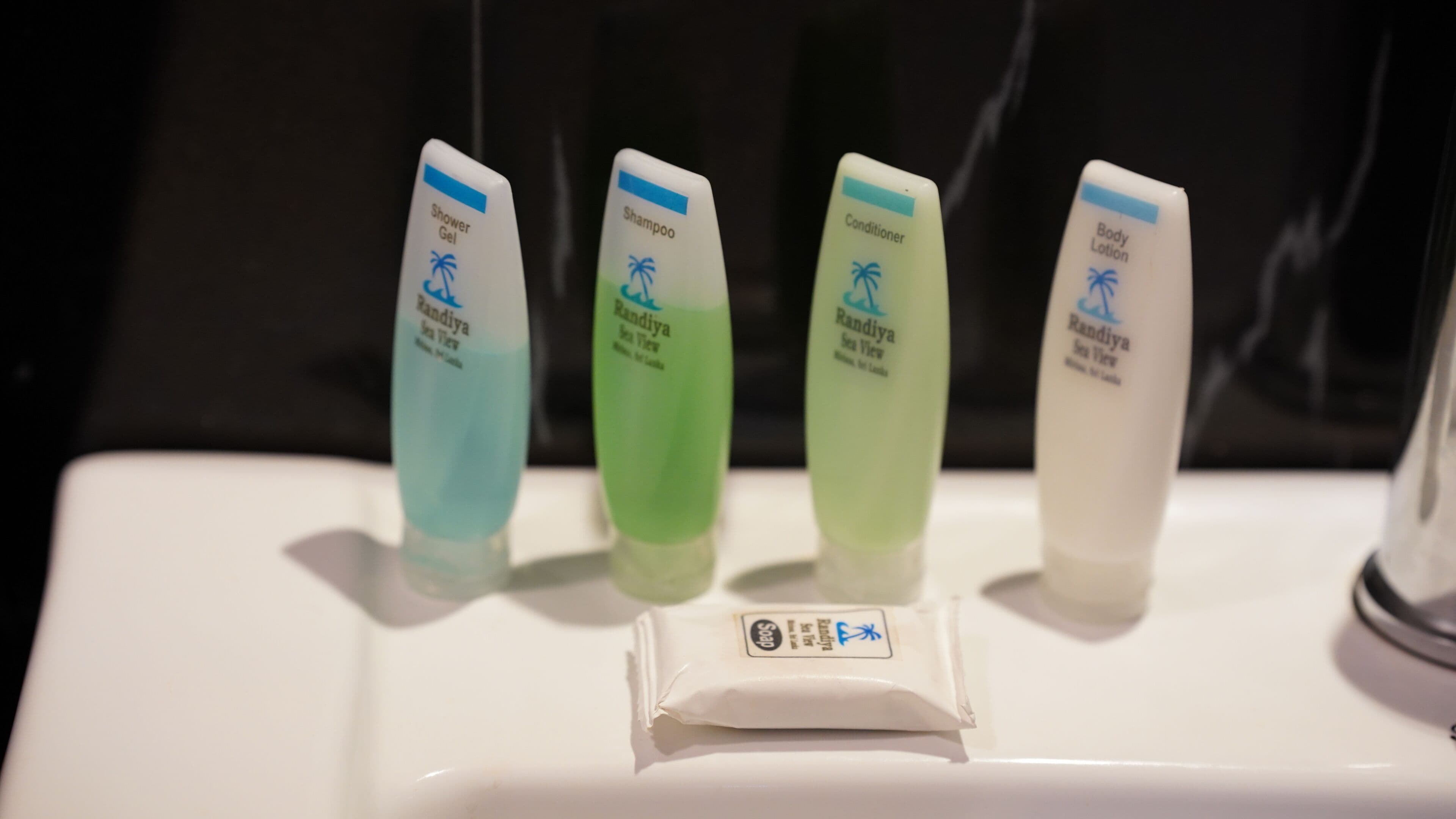 Four bottles of Randiya Sea View products on a white surface.