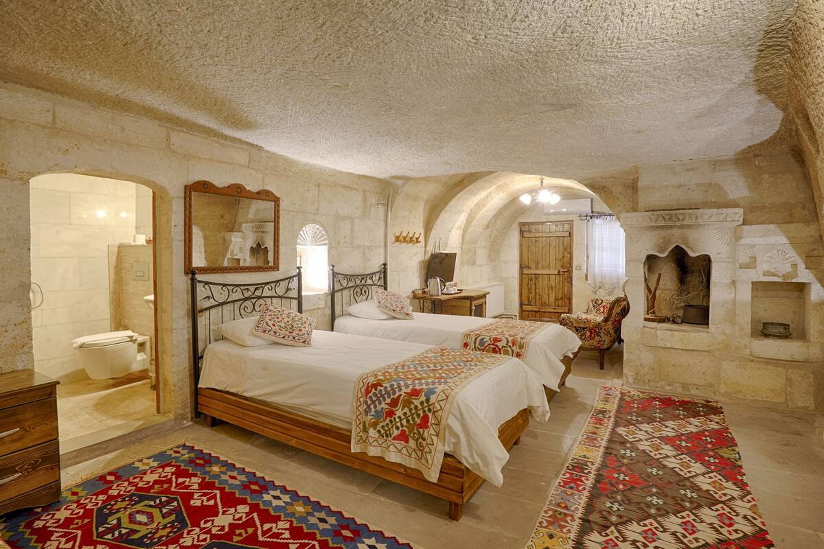 family suite, 2 bedrooms, 2 bathrooms, courtyard view | 1 bedroom, individually furnished, desk, laptop workspace