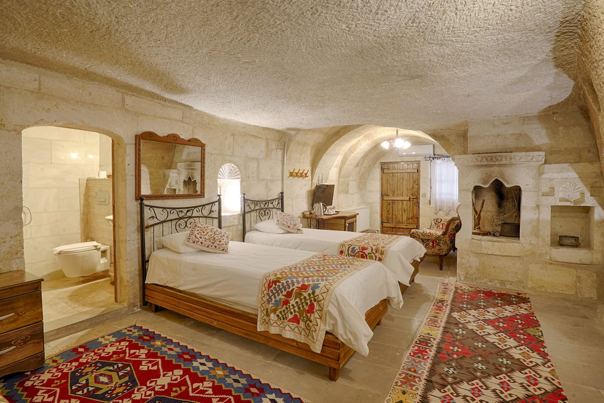 Family Suite, 2 Bedrooms, 2 Bathrooms, Courtyard View | 1 bedroom, individually furnished, desk, laptop workspace