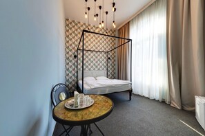 Junior suite | Een minibar, een bureau, een strijkplank/strijkijzer