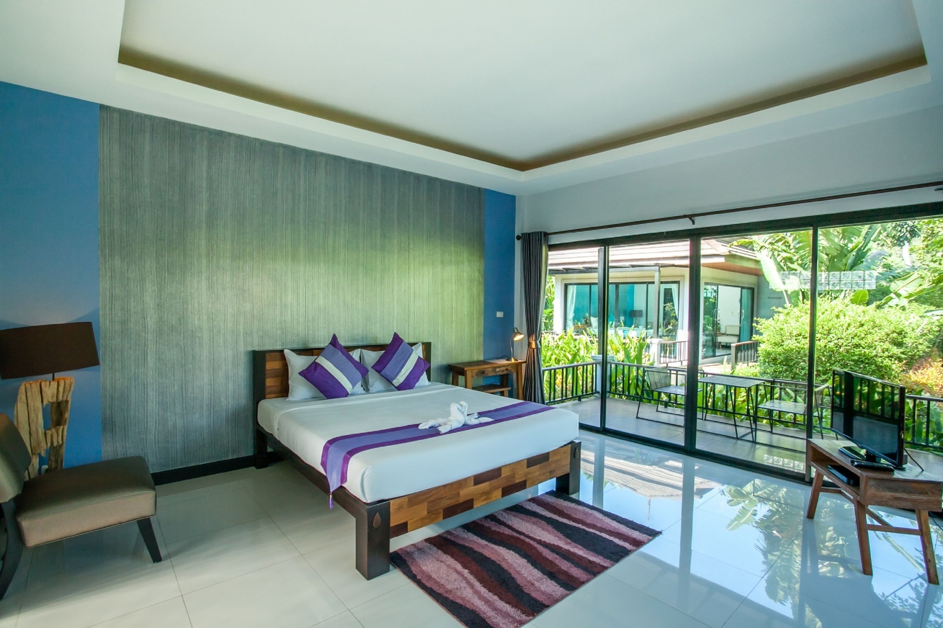 deluxe villa, 1 king bed, garden view, garden area | room amenity