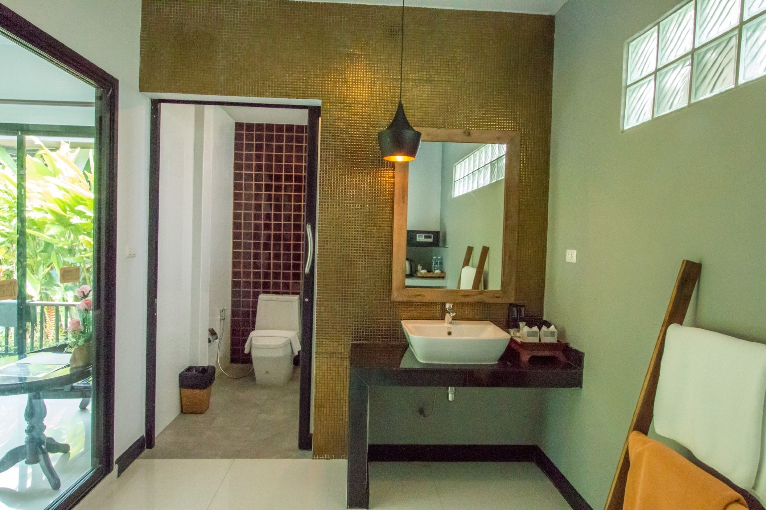 deluxe villa, 1 king bed, garden view, garden area | bathroom | shower, free toiletries, hair dryer, bathrobes