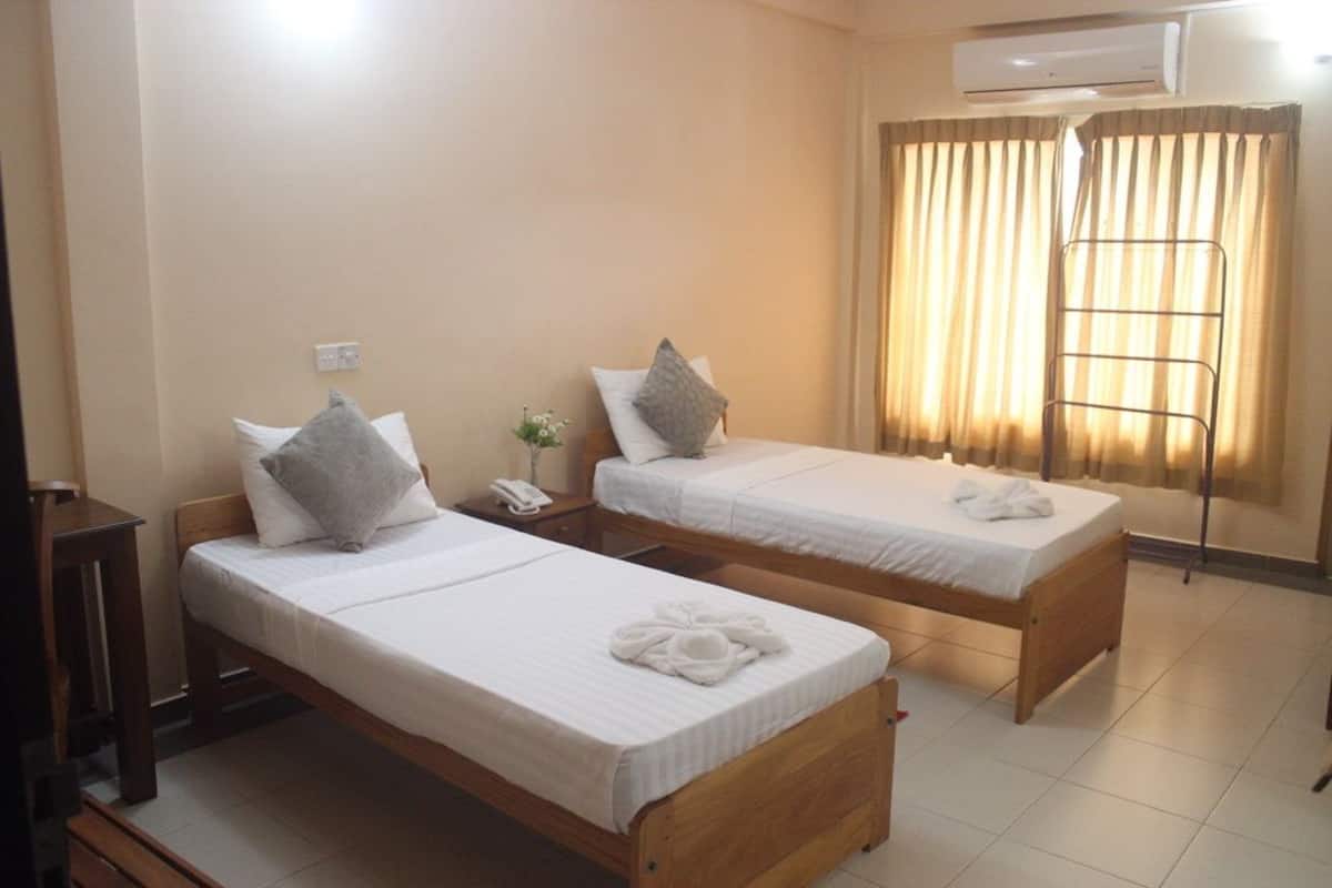 executive a/c single or double room | individually furnished, desk, laptop workspace, iron/ironing board