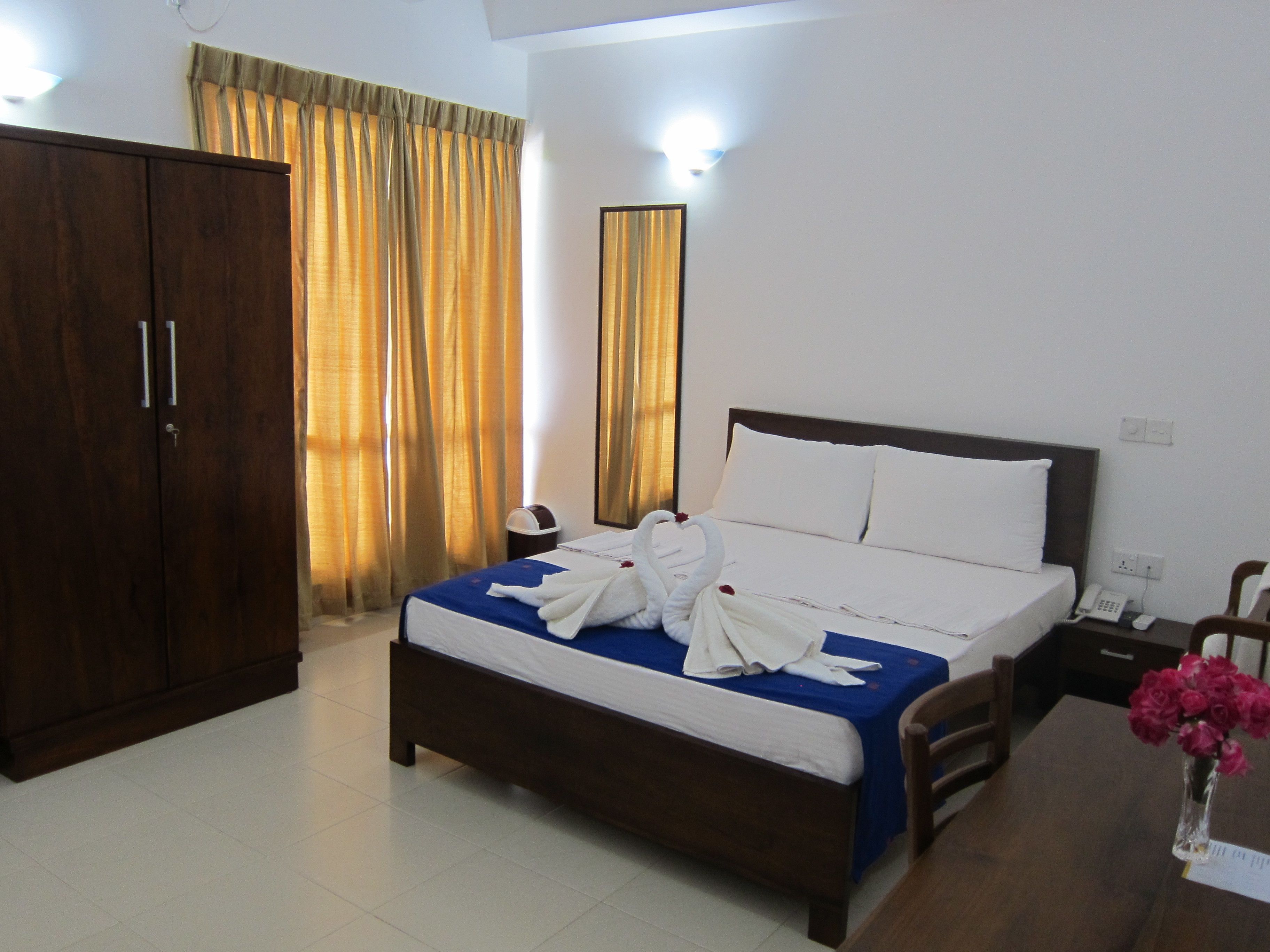 individually furnished, desk, laptop workspace, iron/ironing board