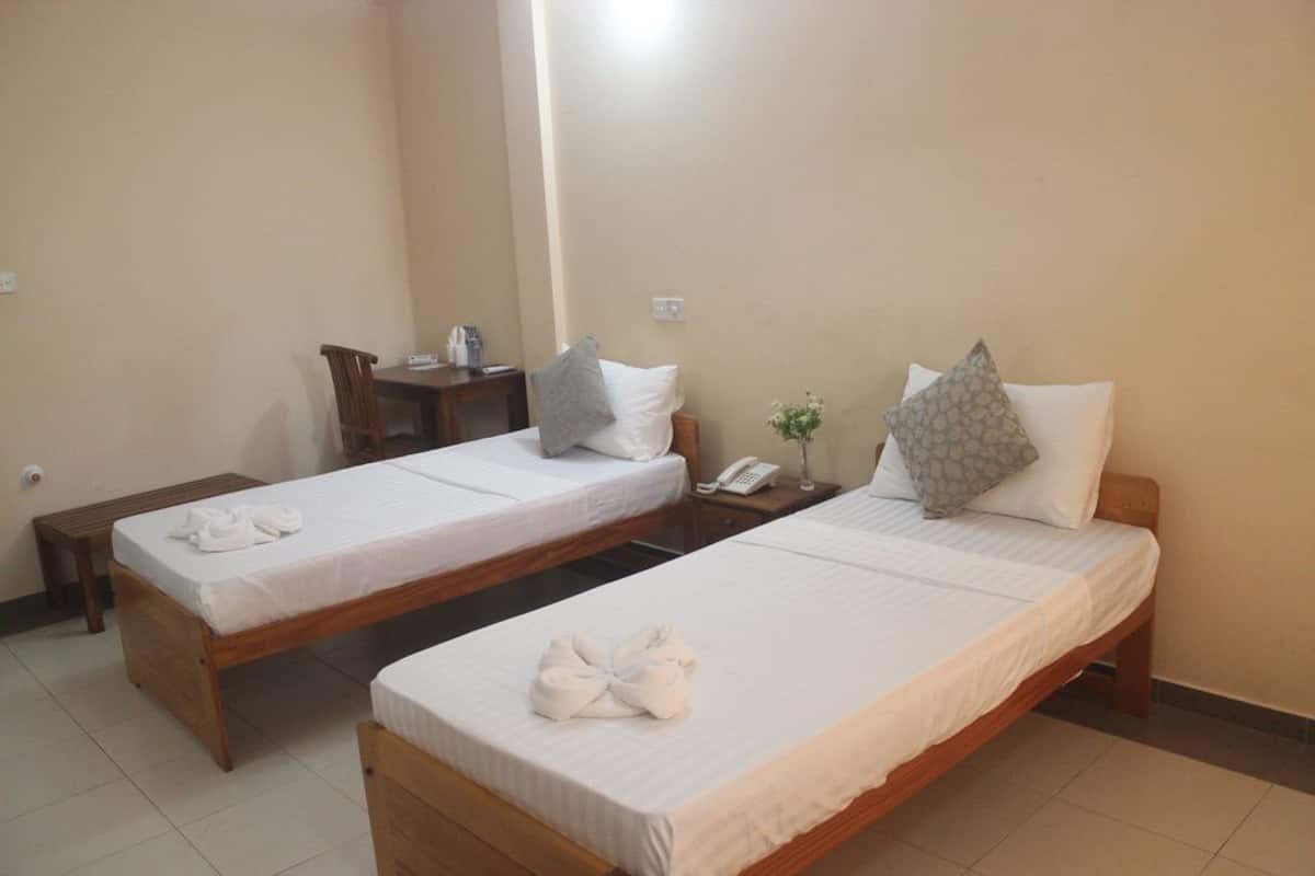 standard a/c single or double room  | individually furnished, desk, laptop workspace, iron/ironing board
