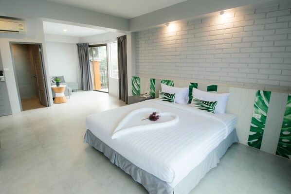 King Suite with Balcony | Premium bedding, minibar, in-room safe, desk