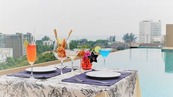 Outdoor pool, open 7:00 AM to 7:00 PM, sun loungers