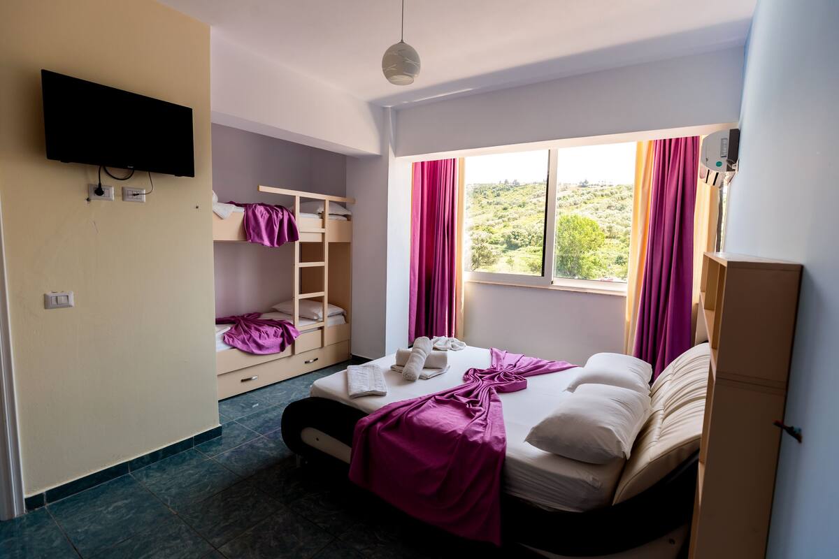 Quadruple Room, Partial Sea View | Premium bedding, WiFi (free), bed sheets