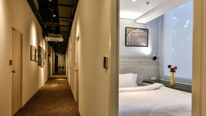 Habitación ejecutiva, vista a la ciudad | Ropa de cama de alta calidad y caja de seguridad en la habitación