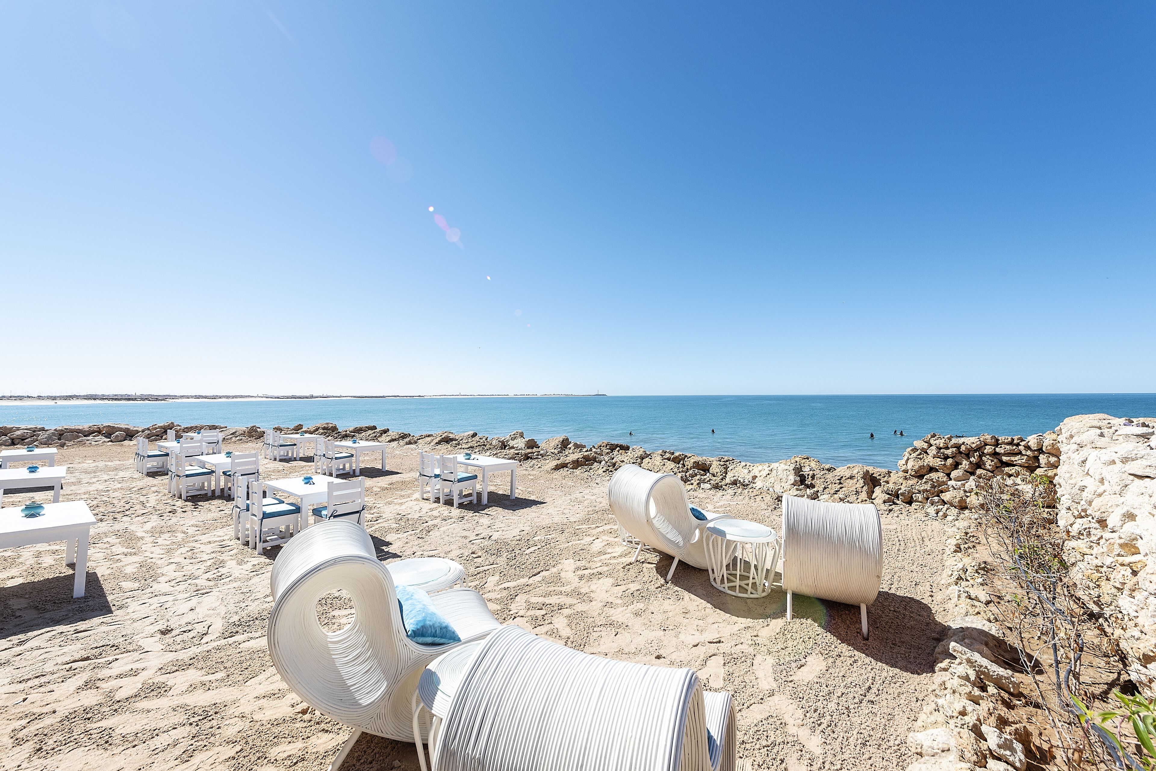 on the beach, white sand, beach bar, surfing