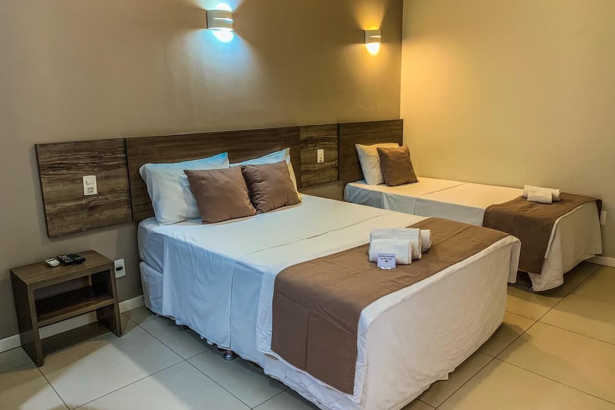 standard triple room | 1 bedroom, minibar, in-room safe, desk