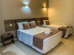 Standard Triple Room | Minibar, in-room safe, desk, blackout drapes