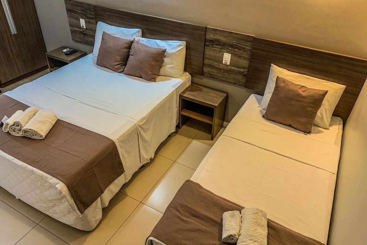 standard triple room | 1 bedroom, minibar, in-room safe, desk