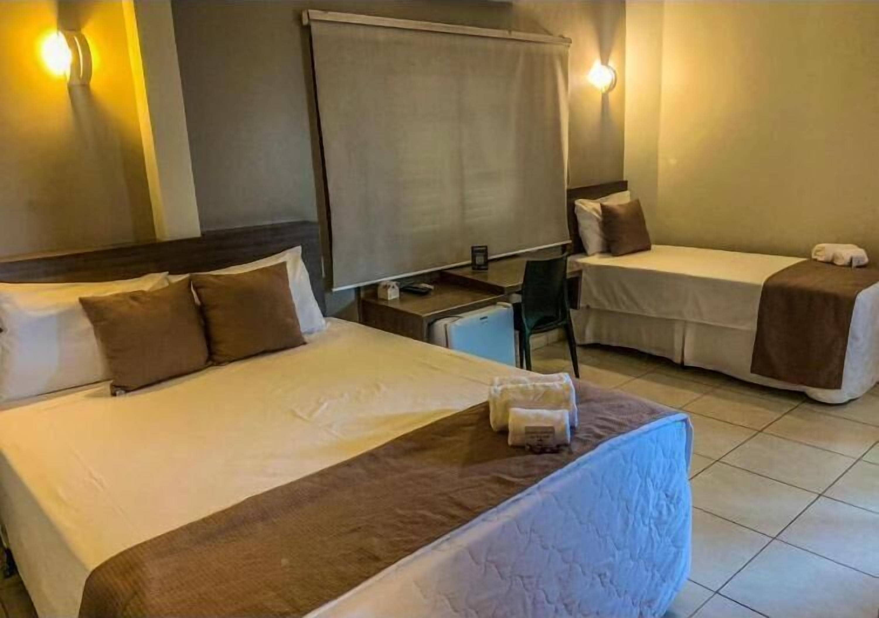 standard triple room | 1 bedroom, minibar, in-room safe, desk