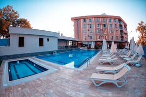 Outdoor pool, pool umbrellas, pool loungers