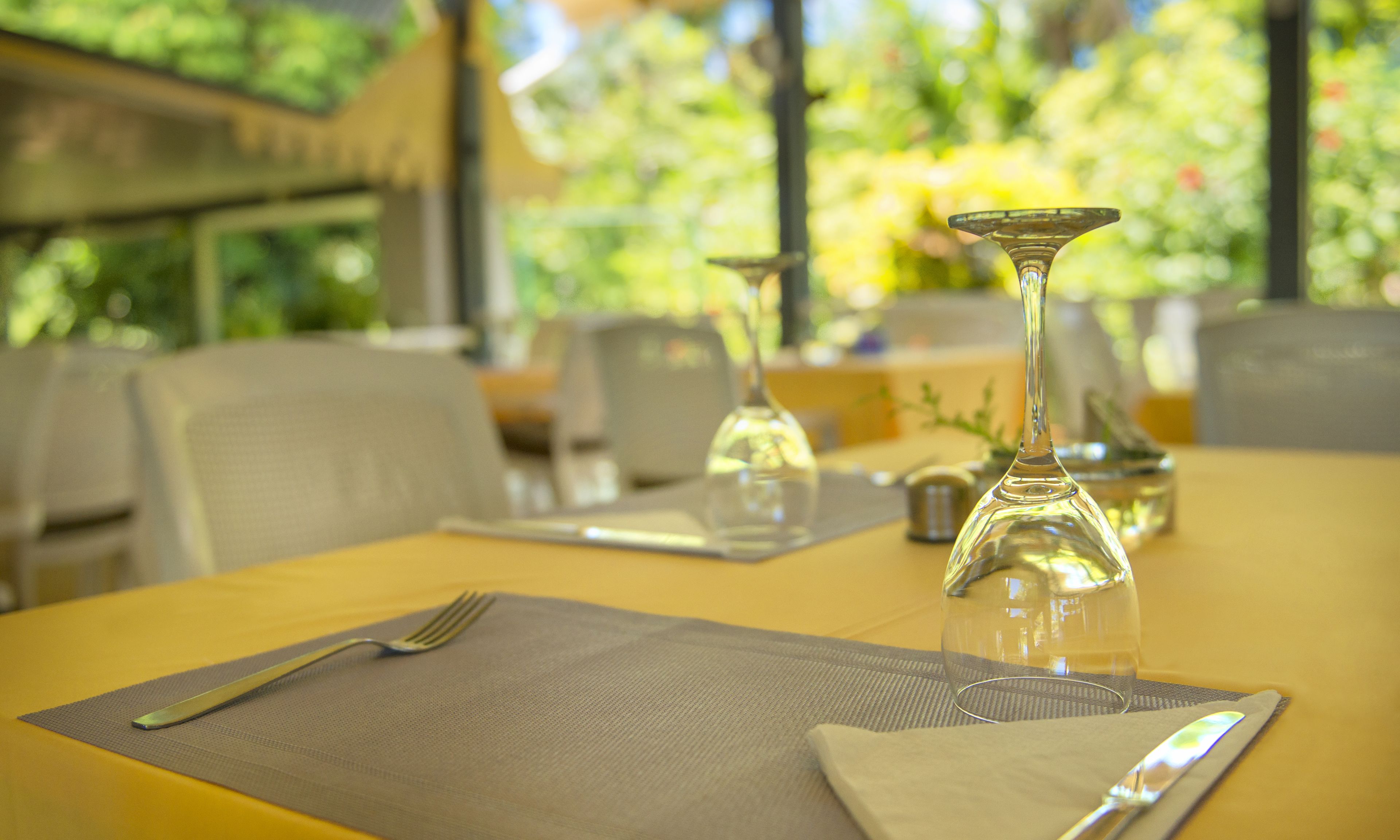 Breakfast, lunch, dinner served; local cuisine 