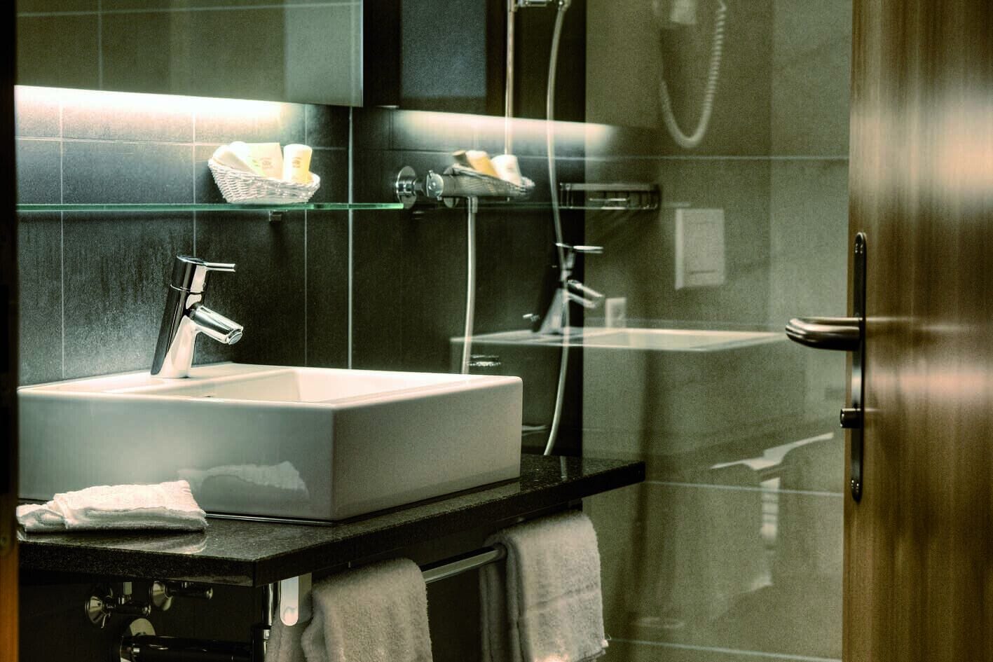 superior double or twin room | bathroom | shower, towels