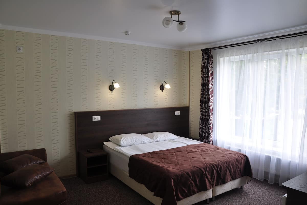 Comfort kamer, 1 twee- of 2 eenpersoonsbedden, 1 slaapkamer | Individueel gedecoreerd, individueel gemeubileerd