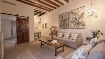 Departamento (Suite) | Área de sala de estar | Smart TV de 42 pulgadas con canales digitales y Netflix